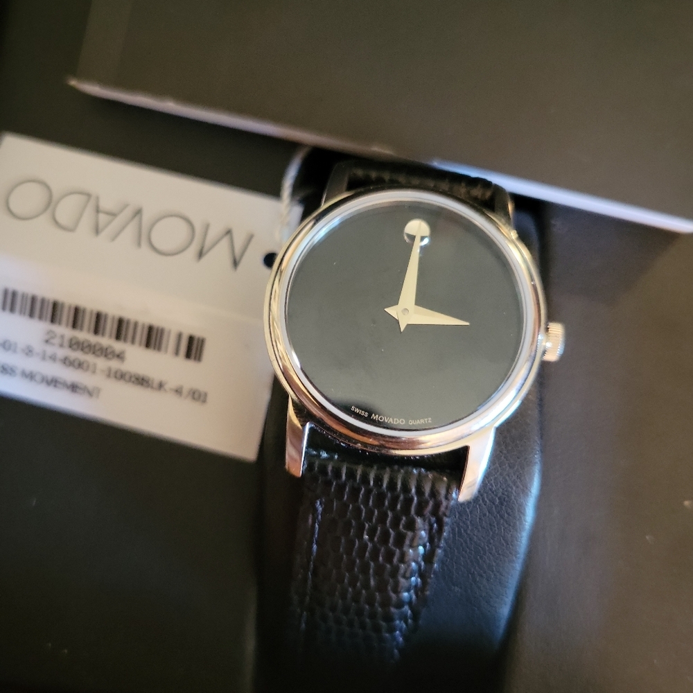 New womens Movado watch, has inscription